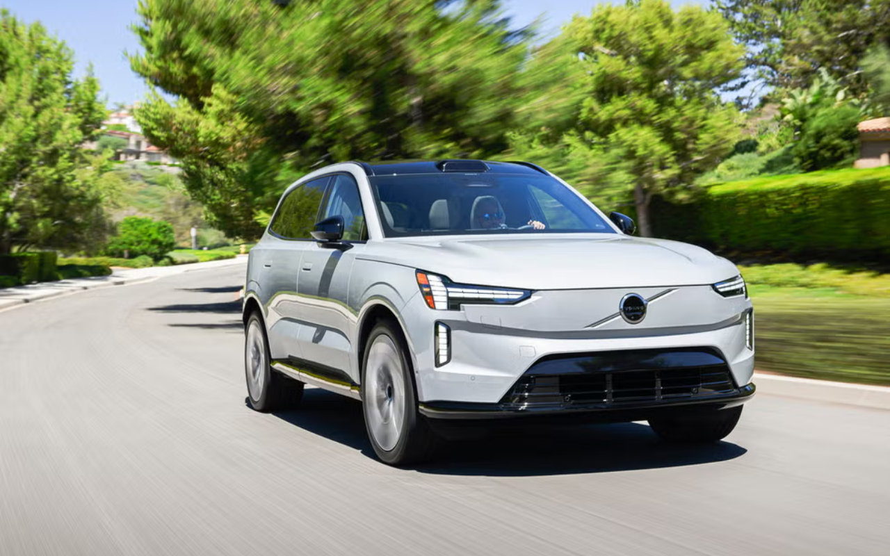 2025 Volvo EX90 Electric SUV parked on a scenic road