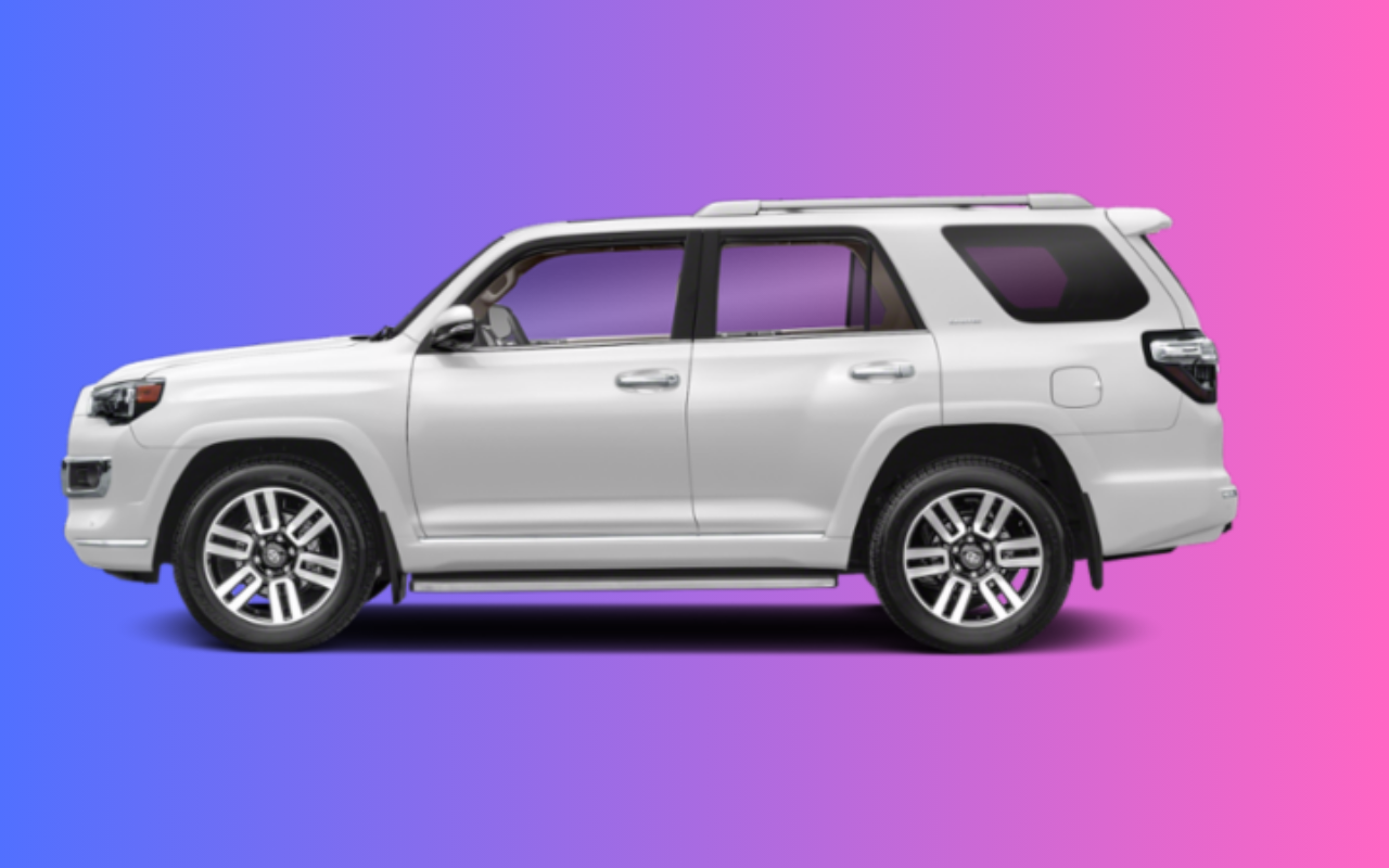 New 2024 Toyota 4Runner Limited 4WD SUV in white parked outside.